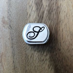 Script letter “S” silver tone charm